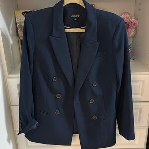 Never worn J. crew navy blazer size 6- amazing quality.